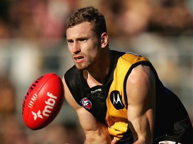 LAUNCESTON, TAS - JUNE 18:  Shane Tuck of the Tigers in action during the round 12 AFL match between the Hawthorn Hawks and the Richmond Tigers at Aurora Stadium on June 18, 2006 in Launceston, Australia.  (Photo by Ryan Pierse/Getty Images)