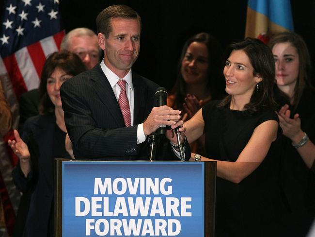 The late Beau Biden, pictured celebrating being re-elected Delaware Attorney General in November 2010, with his wife Hallie. Hallie is now in an affair with Beau’s brother Hunter. Picture: Mark Wilson