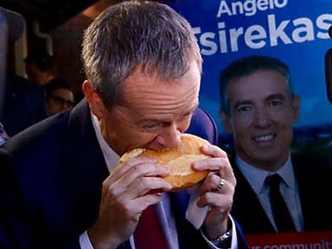 Man in the middle ... Bill Shorten bites into election roll.