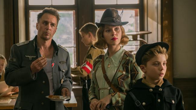 Sam Rockwell, Scarlett Johansson and Roman Griffin Davis in a scene from the movie Jojo Rabbit.Picture: Twentieth Century Fox