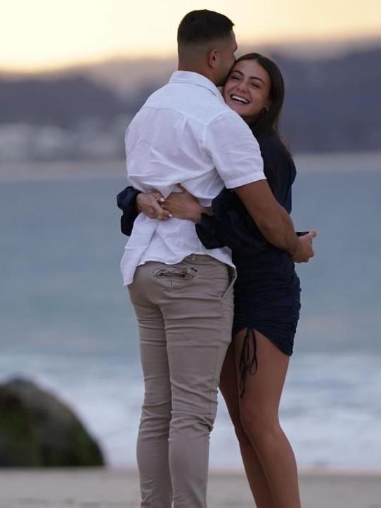 Rabbitohs star Braidon Burns, proposes to his partner Tiannan Pennini at Coolangatta Beach. Picture: Sunny Brar