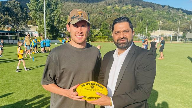 How Indian migrant and Winsher Sports owner Nitin Saby (pictured right) broke into the AFL manufacturing game. Picture: Supplied.