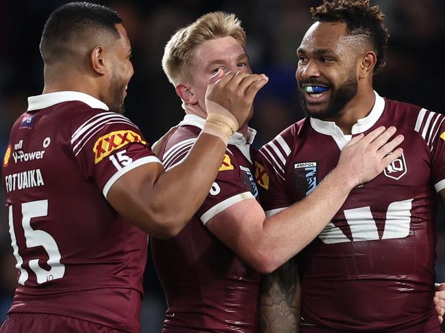 SYDNEY, AUSTRALIA - JUNE 05:  Hamiso Tabuai-Fidow of the Maroons celebrates scoring a try with teammates during game one of the 2024 Men's State of Origin Series between New South Wales Blues and Queensland Maroons at Accor Stadium on June 05, 2024 in Sydney, Australia. (Photo by Matt King/Getty Images)