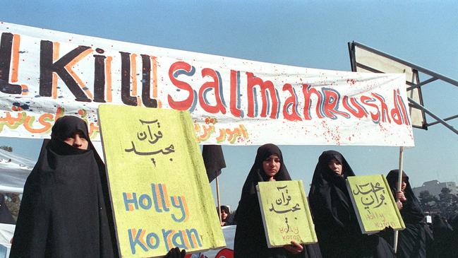 In this photo taken on February 17, 1989, Iranian women are seen holding banners during a demonstration against Salman Rushdie in Tehran. Picture: AFP