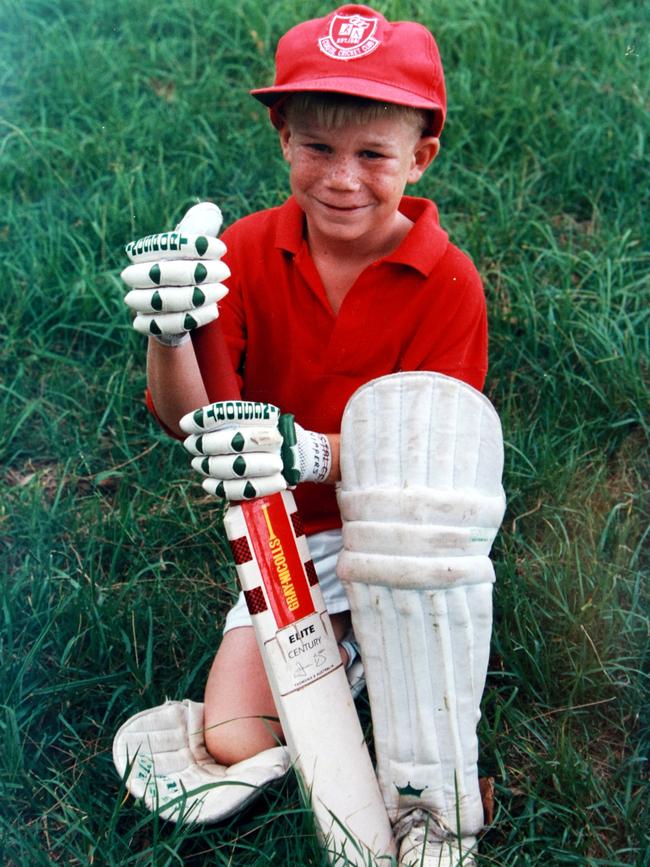 An eight-year-old Warner at his family home in Matraville. Picture: Alan Pryke