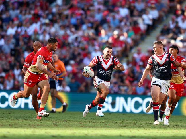 BRISBANE, AUSTRALIA - MARCH 05: James Tedesco of the Roosters runs the ball during the round one NRL match between the Dolphins and Sydney Roosters at Suncorp Stadium on March 05, 2023 in Brisbane, Australia. (Photo by Chris Hyde/Getty Images)