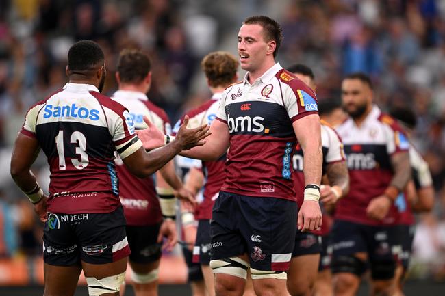 Joe Brial and Filipo Daugunu of the Reds celebrate after winning the round six Super Rugby Pacific match between Highlanders and Queensland Reds at Forsyth Barr Stadium, on March 22, 2025, in Dunedin, New Zealand. Photo by Joe Allison/Getty Images