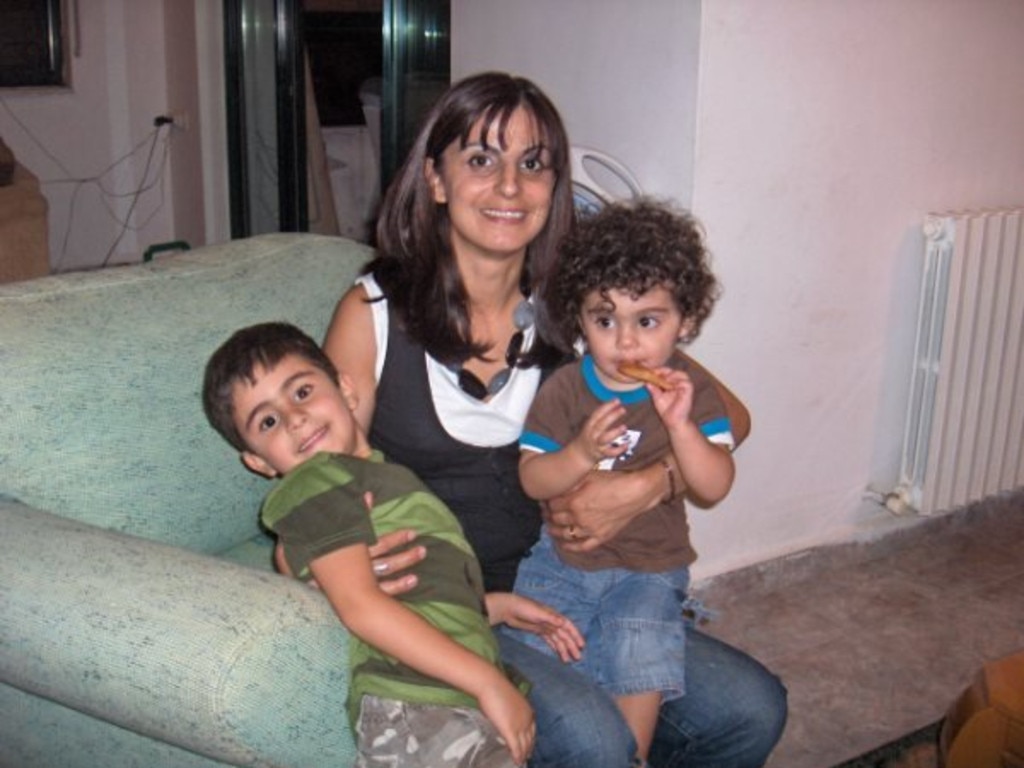 Suheir Zeidan with her two sons shortly after arriving in Australia. Picture: Supplied