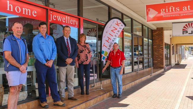 SHOP LOCAL: Supporting the new Shop Local resource kit are (from left) Visit Roma President Charlie Eames, Santos Maranoa Regional Manager Andrew Snars, Mayor Tyson Golder, Councillor Wendy Taylor and Commerce Roma President Cyril Peet.