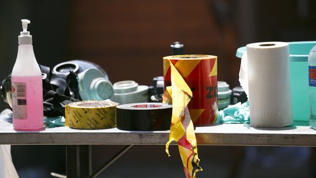 Police and detectives uncovered a large clandestine laboratory manufacturing illicit drugs in Sydney’s south west last night. Picture: Tim Pascoe