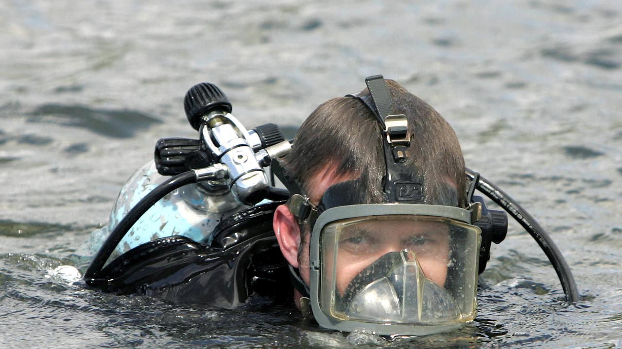 Police divers searching for Julie Nicholson’s remains in 2004.