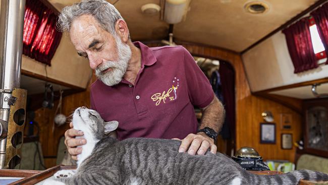 Sylph VI skipper and owner Robert Williams with Oli who will sailing the Sydney to Hobart yacht race on board Sylph VI. Picture: Adam Yip