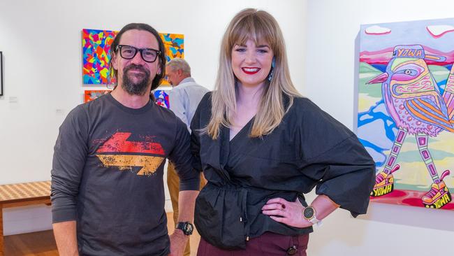 2021 Saltwater Freshwater Aboriginal Arts Award Finalist, Brentyn Lugnan with Coffs Harbour Regional Gallery curator, Chloe Waters in front of fellow 2021 finalist Y.O.W.A's Window Thief 2020. Photo: Brendan Ray