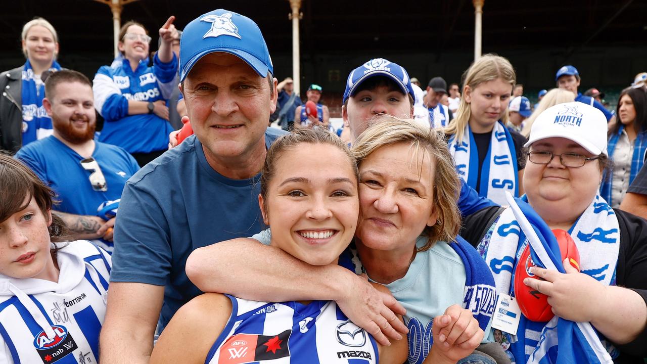 MELBOURNE, AUSTRALIA – NOVEMBER 26: Niamh Martin of the Kangaroos is seen with her parents during the 2023 AFLW Second Preliminary Final match between The North Melbourne Tasmanian Kangaroos and The Adelaide Crows at IKON Park on November 26, 2023 in Melbourne, Australia. (Photo by Michael Willson/AFL Photos via Getty Images)