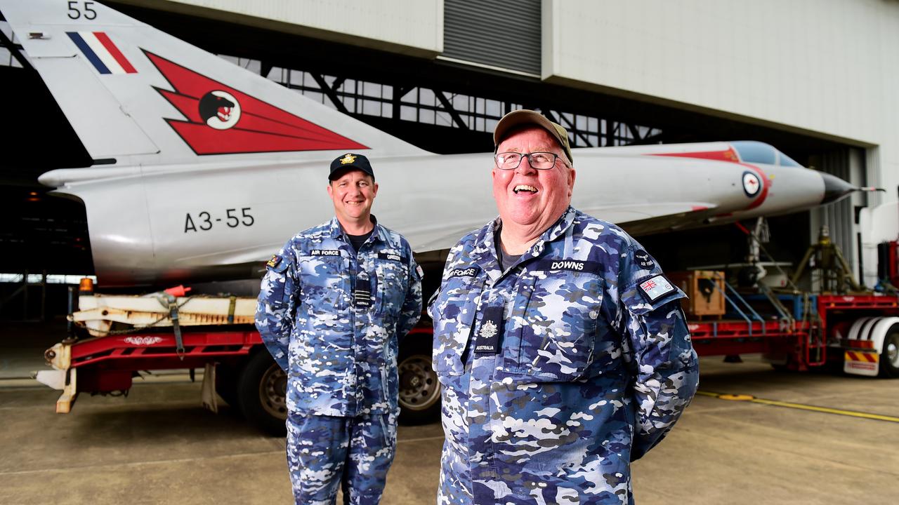 Two restored Royal Australian Air Force aircraft veterans- a Mirage fighter jet A3-55 and a Winjeel Trainer??? A85-403 - arrived at Townsville RAAF Base. WGCDR Mat Green and WO Mike Downs. Picture: Alix Sweeney