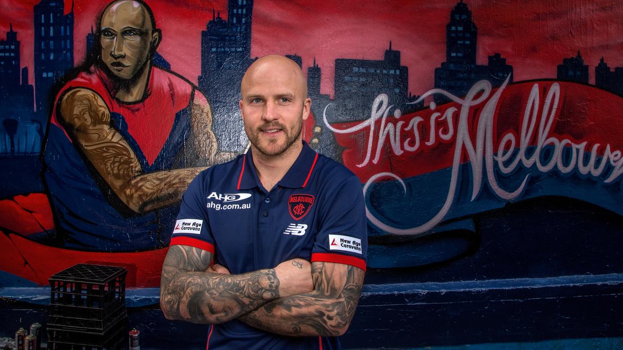 Melbourne Football Club captain Nathan Jones poses for photos in front of the Club's new logo in Hosier Lane Melbourne on Thursday 12th November, 2015. Picture: Mark Dadswell