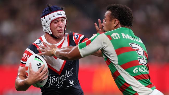 SYDNEY, AUSTRALIA - MARCH 17:  Joseph Manu of the Roosters is tackled by Isaiah Tass of the Rabbitohs during the round three NRL match between Sydney Roosters and South Sydney Rabbitohs at Allianz Stadium on March 17, 2023 in Sydney, Australia. (Photo by Mark Kolbe/Getty Images)