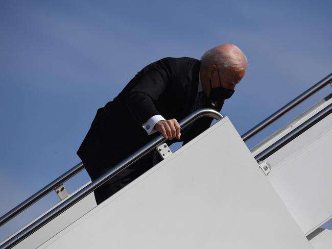 President Joe Biden trips as he boards Air Force One in 2021. Picture: AFP