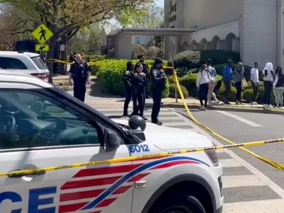 Police urged people in the area to look out for a green vehicle fleeing the scene after a gunman opened fire on mourners outside a funeral home. Picture: John Henry/WUSA9