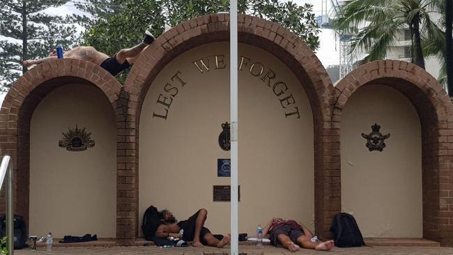 Men photographed sleeping in and on top of the Burleigh Heads War Memorial. Picture: Supplied