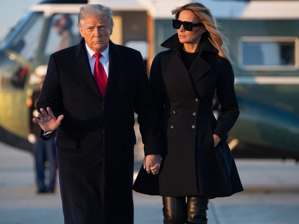 The Trumps were pictured walking to board Air Force One prior to departure from Joint Base Andrews in Maryland on December 23. Picture: Saul Loeb