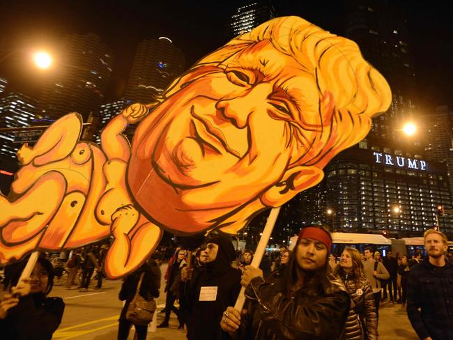 People take part in a protest near Trump Tower in Chicago. Picture: Paul Beaty/AFP