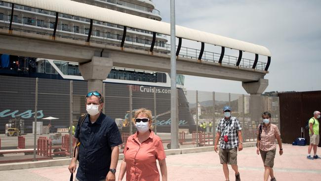 Tourists embarking on German cruise ship Mein Schiff 2 in Malaga, Spain this week. On June 7, Spain's transport ministry lifted a ban on international cruise ships imposed at the beginning of the coronavirus pandemic. Picture: Jorge Guerrero/AFP