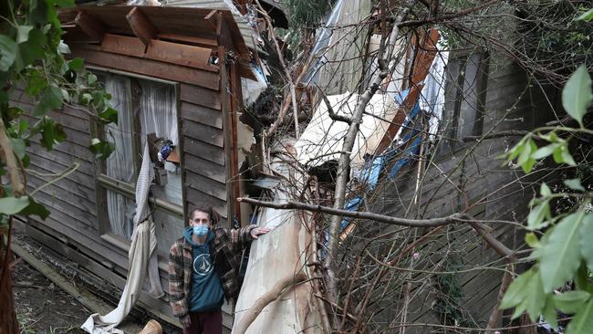 Josh O’Connell in Kaola street in Belgrave rescued his elderly neighbour from this house when tree came down in last nights wild weather in Melbourne. Picture: David Crosling