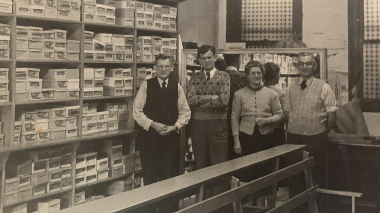 Albert Feil and Ron Feil (pair on the left) at The Bootery shoe shop in Toowoomba's CBD. Photo taken in 1950s.