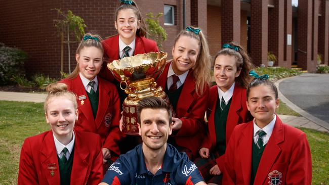 Norwood footballer Matthew Panos with his Kildare College students Natasha, Amber, Mia, Janelle, Olivia and Alana. Picture: Matt Turner