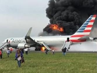 Passengers flee burning plane