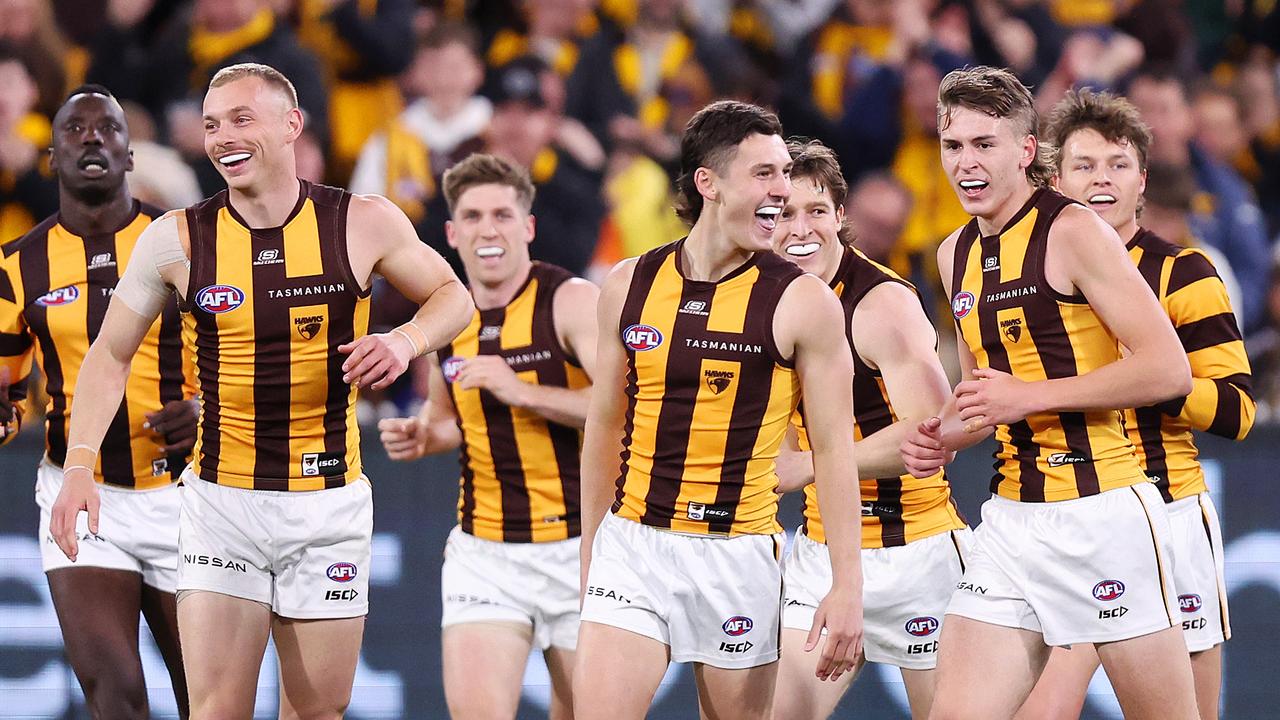 MELBOURNE, SEPTEMBER 6, 2024: 2024 AFL Football - Elimination Final - Western Bulldogs v Hawthorn at the MCG. The hawks celebrate a goal. Picture: Mark Stewart