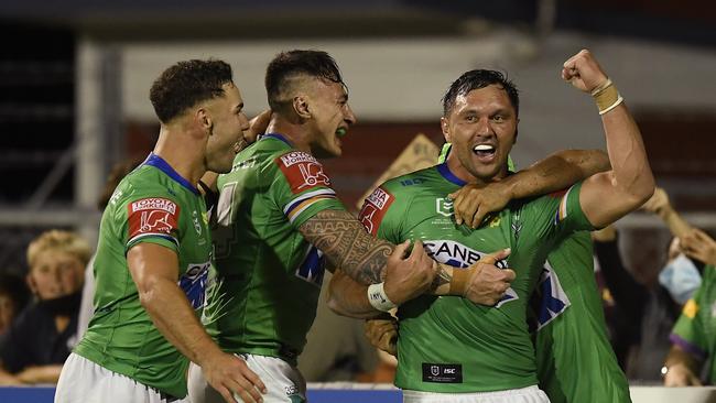 MACKAY, AUSTRALIA - AUGUST 27: Jordan Rapana of the Raiders celebrates after scoring the game winning try during the round 24 NRL match between the New Zealand Warriors and the Canberra Raiders at BB Print Stadium, on August 27, 2021, in Mackay, Australia. (Photo by Ian Hitchcock/Getty Images)