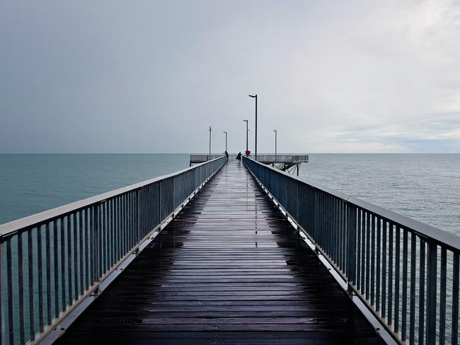 Nightcliff Jetty is a popular place for locals and tourists to start their day with a walk or wind down in the evening but what lurks below … Picture: Michael Franchi.