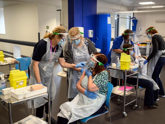 The NHS is in the process of deploying thousands of volunteers to increase the rollout of vaccinations across the UK in the fight against Covid-19. Picture: AFP