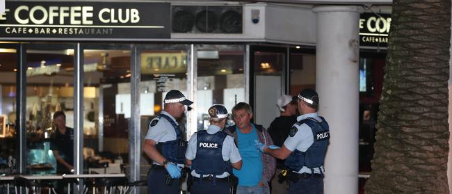 Police talking to witnesses following the brawl. Picture: Richard Gosling