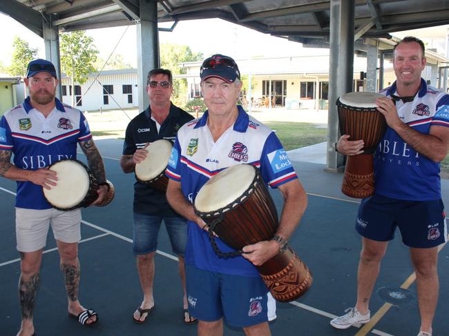 (Left) Roger Johnston, Brad Baker, Warren Abbey and Paddy Andrews were about of the charity rugby league Chiefs vs Brothers old boys match that fundraised over $10,000 for NRL Cowboys house. Buying drums for the students