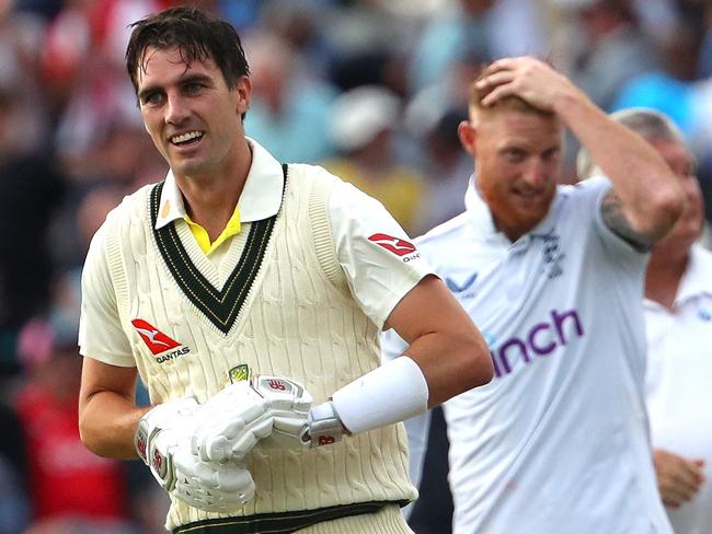 An elated Pat Cummins and a beaten-but-unbowed Ben Stokes react after the stunning conclusion to the first Ashes Test. Picture: Geoff Caddick/AFP