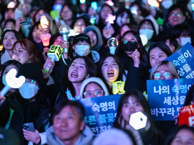 Protesters calling for the ouster of the South Korea President react after the result of the second martial law impeachment vote outside the National Assembly in Seoul. Picture: AFP