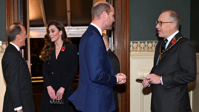 Prince William, meanwhile, does his traditional hobnobbing, armed with facial hair, which is his current fashion experiment. Picture: Chris J. Ratcliffe/AFP