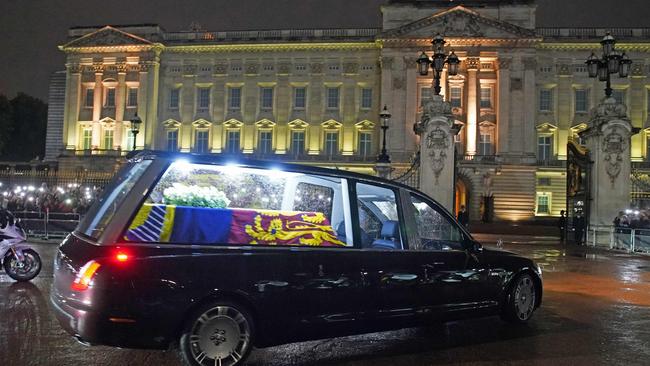 The coffin of Queen Elizabeth II arrives in the Royal Hearse at Buckingham Palace in London.