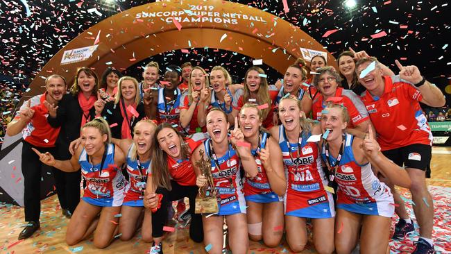 Swifts players celebrate winning the Super Netball grand final last September