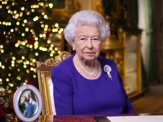 WINDSOR, ENGLAND:  (EMBARGOED UNTIL 15.00 IN YOUR LOCAL TIME ZONE ON 25TH DECEMBER 2020) No use after 24 January 2021 without the prior written consent of The Communications Secretary to The Queen at Buckingham Palace. In this pool image released on December 25th, Queen Elizabeth II records her annual Christmas broadcast in Windsor Castle, Windsor, England. (Photo by Victoria Jones - WPA Pool/Getty Images)