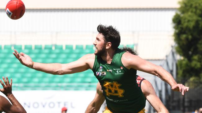 St Mary’s Jarrad Waite tries to grab the football in a Round 3 match against the Tiwi Bombers. Picture: KATRINA BRIDGEFORD.