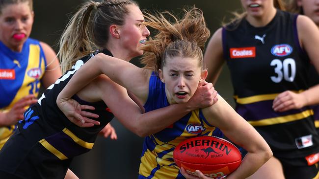 MELBOURNE, AUSTRALIA - JULY 22: Indi Stanley of the Western Jets is tackled during the round 15 Coates Talent League Girls match between Western Jets and Murray Bushrangers at Highgate Reserve on July 22, 2023 in Melbourne, Australia. (Photo by Graham Denholm/AFL Photos via Getty Images)