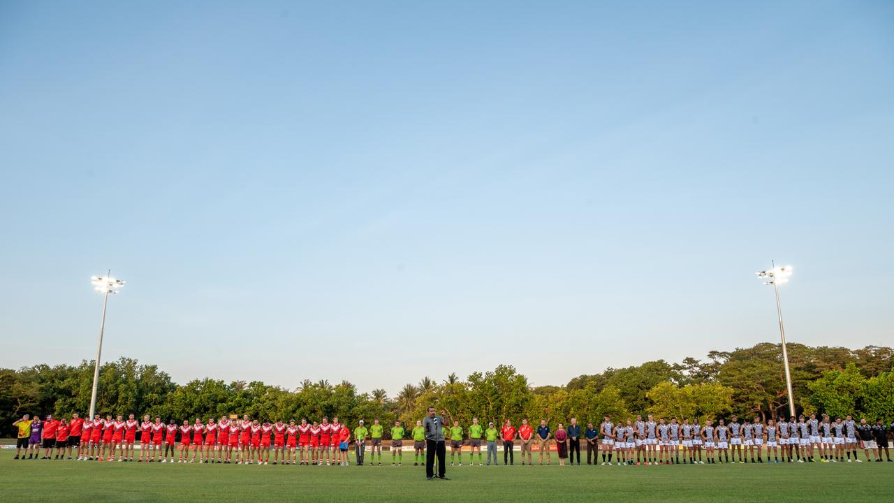 The Waratahs pay tribute to late, great ruckman Alexander ‘Rooch’ Aurrichio at the first game under lights at Gardens Oval. Picture: Aaron Black/AFLNT Media