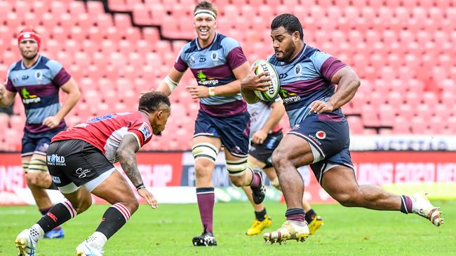 Taniela Tupou in full flight for the Reds. Picture: Sydney Seshibedi/Gallo Images/Getty Images