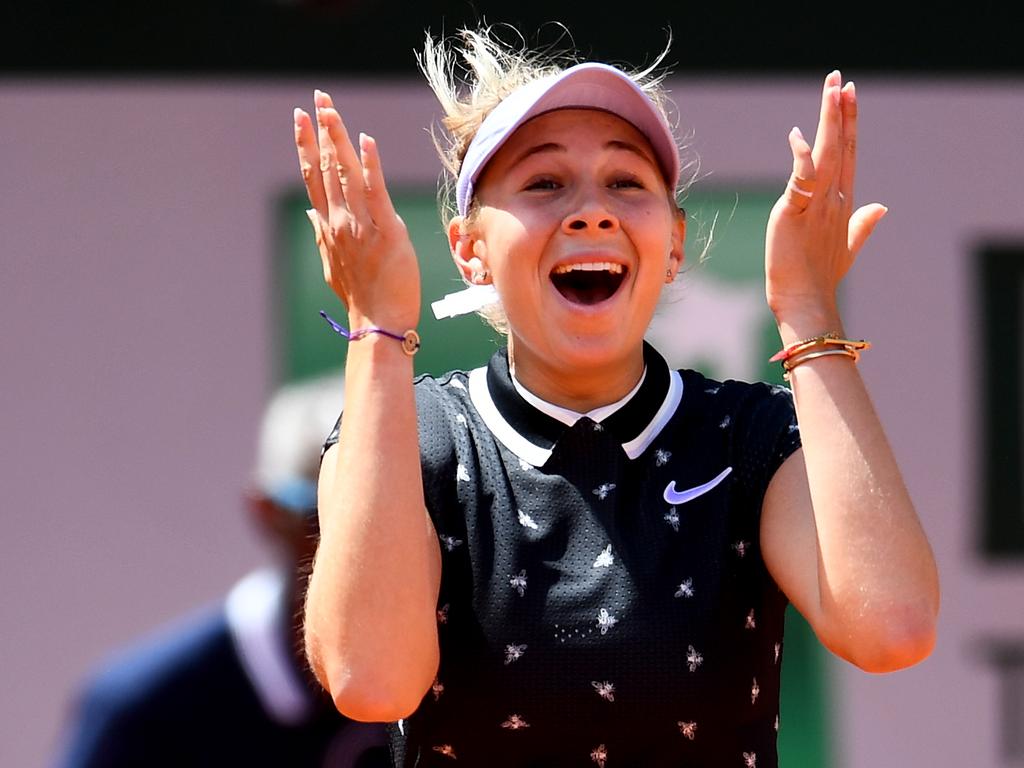 Amanda Anisimova celebrating her shock victory over Simona Halep in the 2019 French Open.