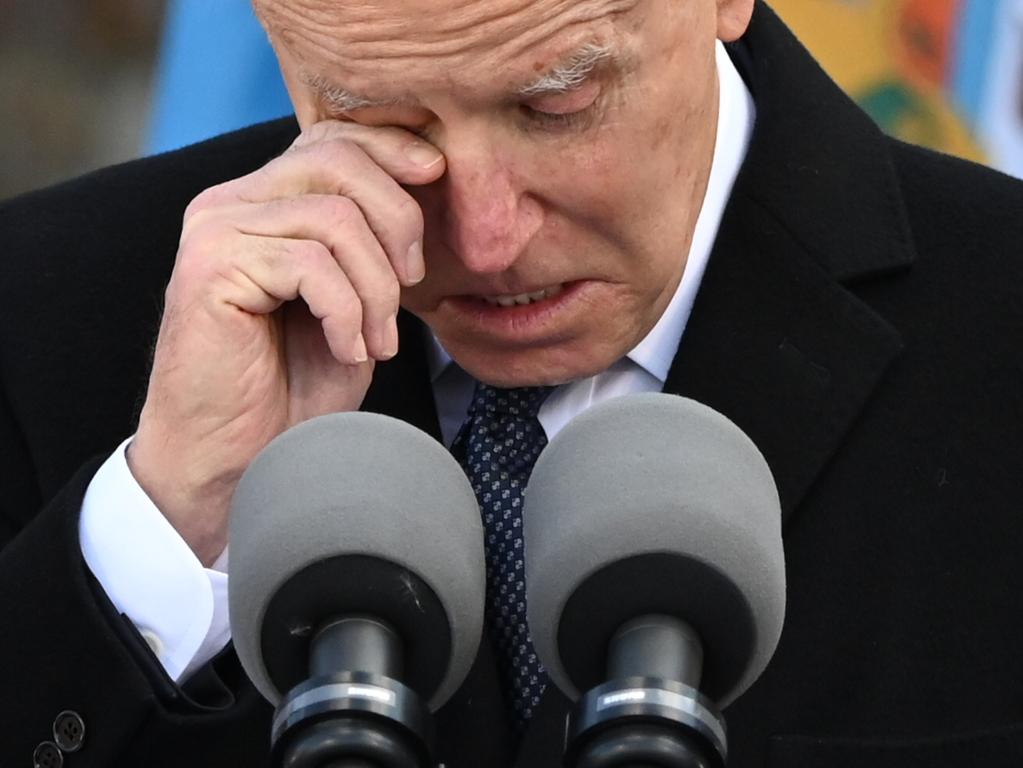 US President-Elect Joe Biden wipes a tear as he speaks at Major Joseph R. "Beau" Biden III National Guard /Reserve Center in New Castle Airport in New Castle, Delaware, before departing for Washington, DC. Picture: AFP