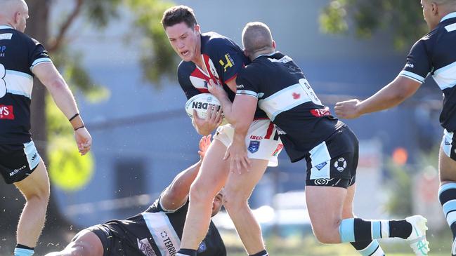 Erina’s Nathan Dwyer with the ball. Picture: Sue Graham